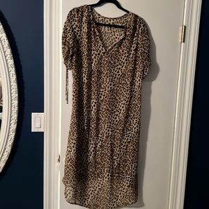 Like new. Great condition sheer leopard cover up